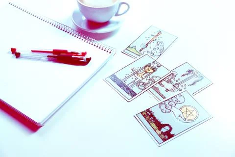 Deck of Tarot cards on a table. Learning about Aces Stock Photos