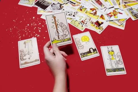 Deck of Tarot cards on a table. Learning about Aces Stock Photos