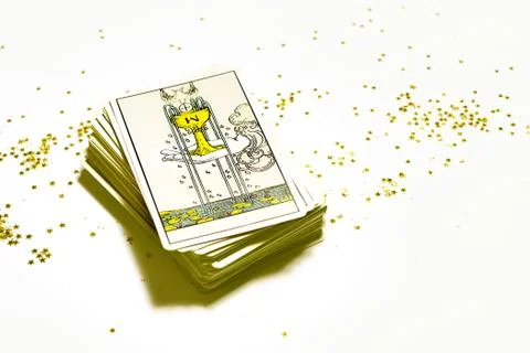 Deck of Tarot cards on a table. Learning about Aces Stock Photos