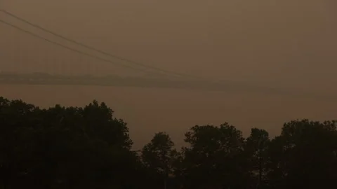 Deck of the Verrazano Narrows Bridge Engulfed in Smoke from Canadian Wildfires Stock Footage 243237182