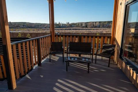 A deck with a view of the mountains Stock Photos