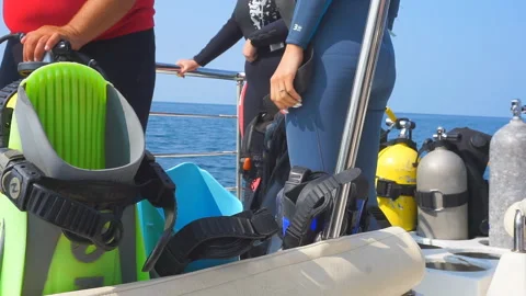 Deck on which divers and diving equipment are located.Divers before diving. Stock Footage 117517386