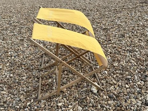 Deckchairs on the beach Stock Photos
