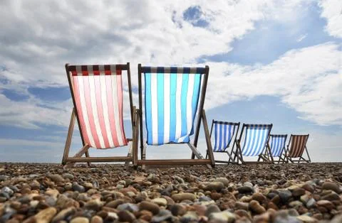 Deckchairs on Brighton beach Stock Photos