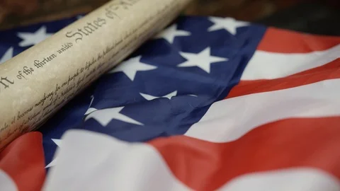 Declaration of independence across frame with flag Stock-Footage 88960232
