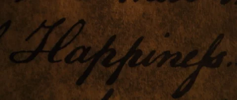 Declaration of Independence Happiness is highlighted by flickering candle light Stock Footage 224931632