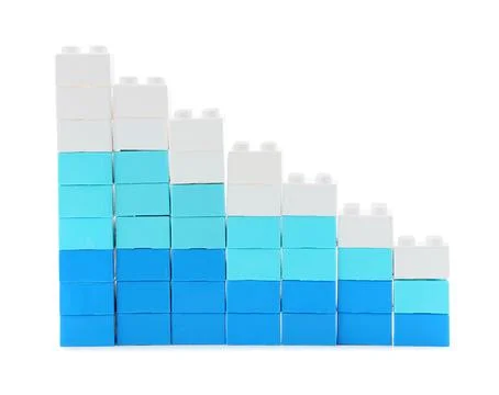 Declining bar graph made of blue and white toy building blocks, financial los Stock Photos