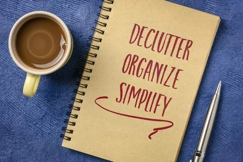 Declutter, organize, simplify - writing in a notebook Stock-Fotos