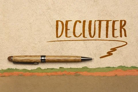 Declutter word - minimalism concept Stock Photos