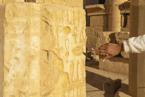 Decoding History: A Fingertip's Journey Stock Photos