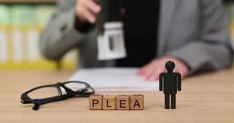 Decoding a pivotal moment in court with plea details and preparation at a legal Stock Footage 320630962
