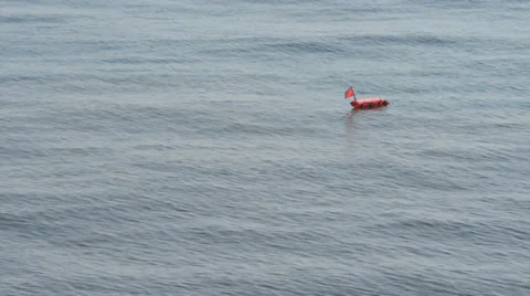 Decompression buoy on sea surface 스톡 동영상 33953050