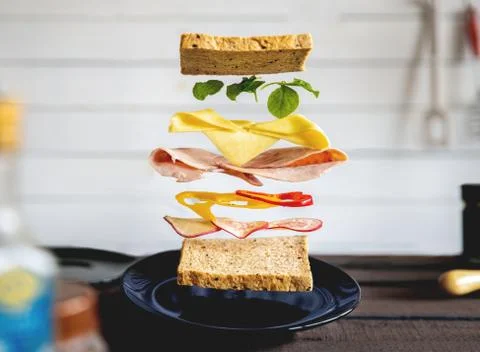 Deconstructed sandwich layers in kitchen Stock Photos