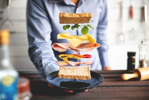 Deconstructed sandwich layers in kitchen Stock Photos