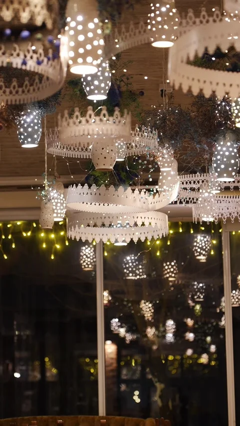 Decor and lighting in a cozy space for an evening gathering Video stock 328578215