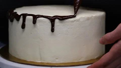 Decor cake by chocolate icing, close-up. Stock Footage 125024614