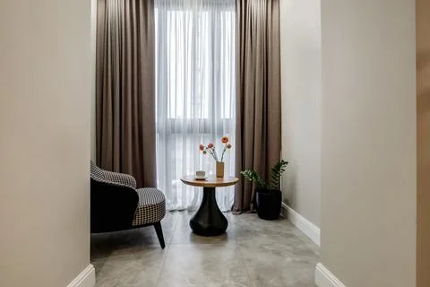 Decor elements of the guest room and rest room with a tea table, an armchair  Stockfoto's