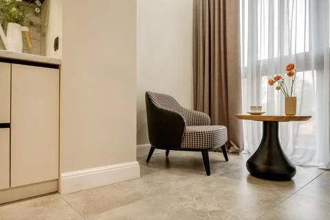 Decor elements of the guest room and rest room with a tea table, an armchair  Stockfoto's