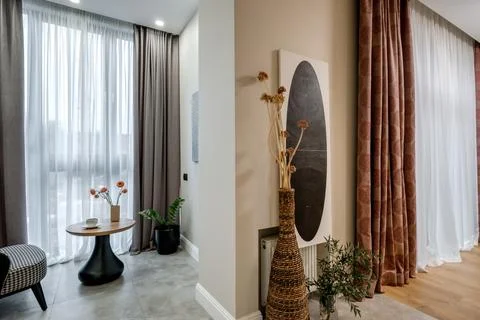 Decor elements of the guest room and rest room with a tea table, an armchair  Stockfoto's
