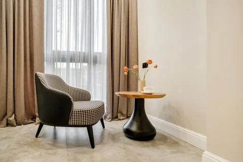 Decor elements of the guest room and rest room with a tea table, an armchair  写真素材