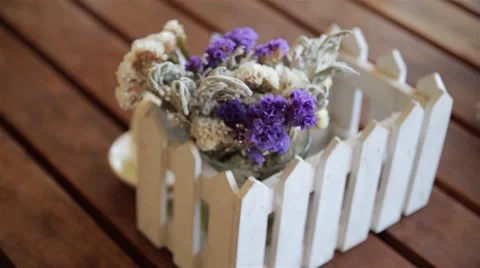 Decor with flowers. Wood table Stock Footage 60600041