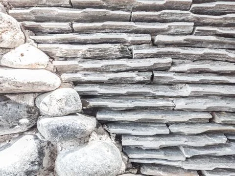 Decor stone brick wall texture, siding horizontal diagonal lines different sized Stock Photos