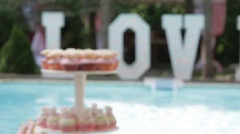 Decor Sweet Table. White Table With wedding cakes Stock Footage 64348168