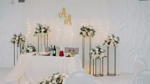 Decor of the wedding table of the bride and groom Stock Footage 130763321