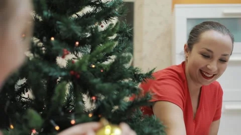 DECORATE THE CHRISTMAS TREE  Stock Footage 167343249