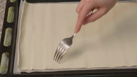 Decorate the rustic pizza with a fork Stock Footage 125672330