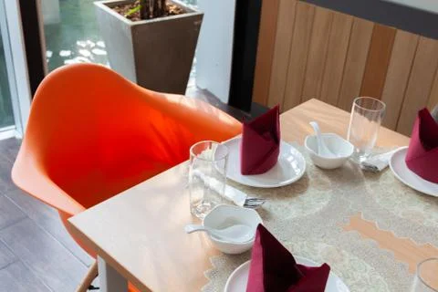 Decorate serving table setting for party with red napkin Stock Photos