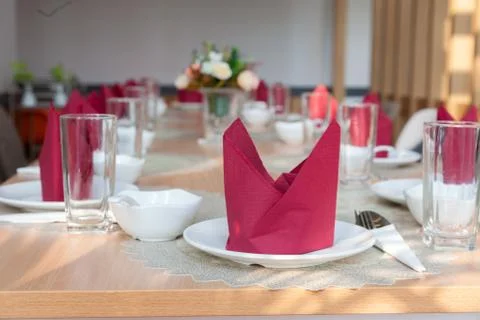Decorate serving table setting for party with red napkin Stock Photos