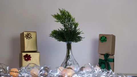 Decorate the table with gift boxes and led lights. Surprise gifts are waiting fo Vídeo Stock 142057706