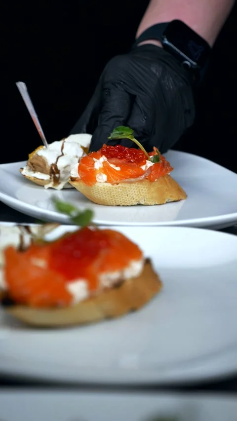 Decorated banquet table with appetizers canapes. buffet for the holiday Stock Footage 337592460