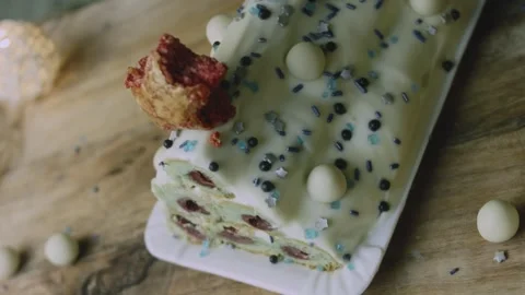 Decorated cake top captured with candy and confetti Stock Footage 342129690