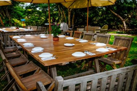 Decorated camping table with dishes Stock Photos