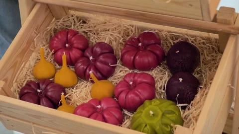 Decorated candles in shape of different vegetables Stock Footage 299811286