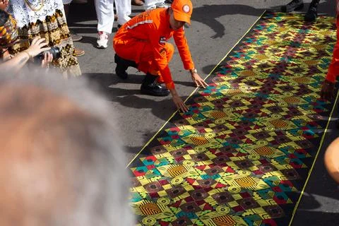 Decorated carpet in street procession Stock Photos