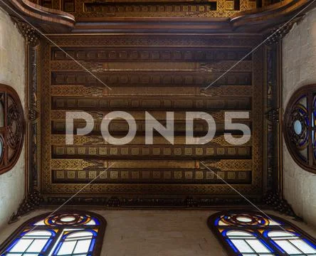 Decorated ceiling with floral pattern decorations and stained glass windows Stock Photos