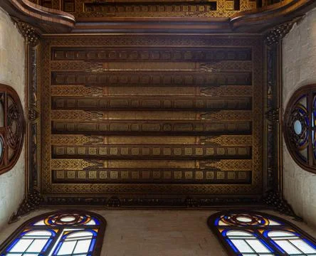 Decorated ceiling with floral pattern decorations and stained glass window... 스톡 사진