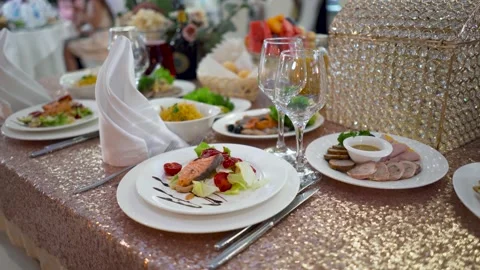Decorated chairs and set round tables in the restaurant ready to receive guests Vidéo 171293355