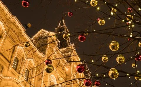 Decorated with Christmas balls tree in front of the building Stock Photos