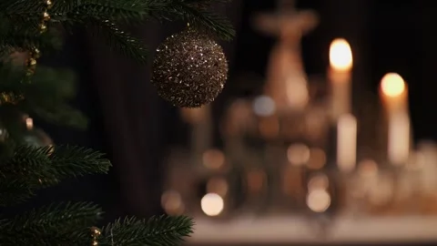 Decorated Christmas tree against of burning candles Stock Footage 292807780