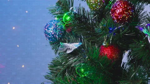 Decorated Christmas tree on a blue background Stock Footage 145728741