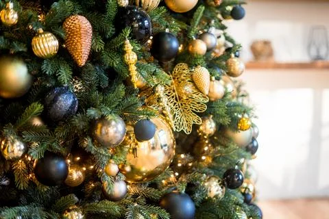 Decorated Christmas tree on blurred background. Stock Photos