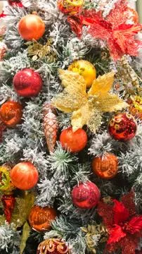 Decorated Christmas tree on blurred, sparkling and fairy background. Stock Photos