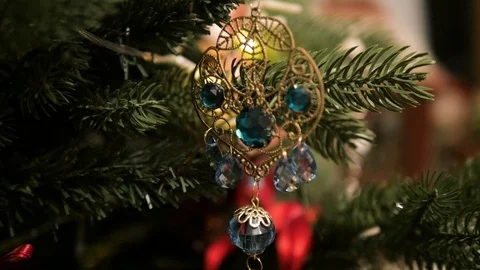Decorated Christmas tree closeup. Red and golden balls and illuminated garland Stock Footage 99245857