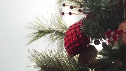 Decorated Christmas tree closeup with red ball Stock Footage 147670528