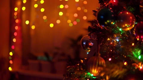 Decorated Christmas tree with flashing lights at home Stock Footage 144019735