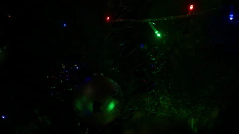 Decorated Christmas Tree with Glowing Lights and Ornaments Close-Up Stock Footage 146112107